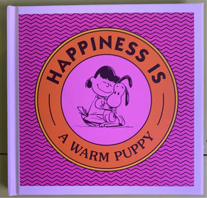 Happiness is a warm puppy, Charles M. Schulz